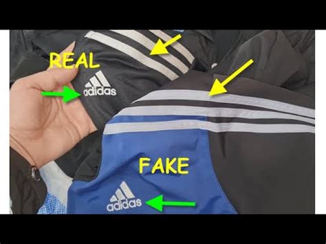 fake adidas tracksuit|adidas real or fake.